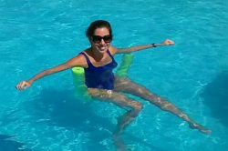 Lady participating in aquatic fitness program